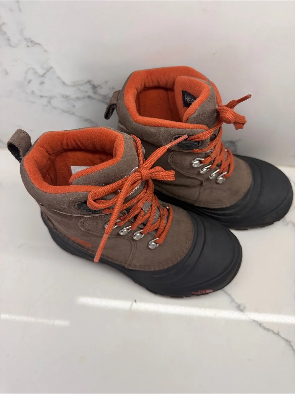 The North Face Brown Suede Kids Boots with Orange Laces